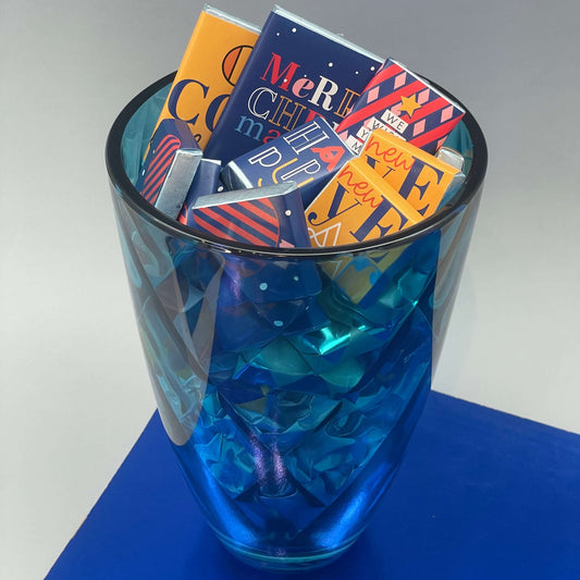 Elegant Blue Vase filled with Christmas themed chocolates
