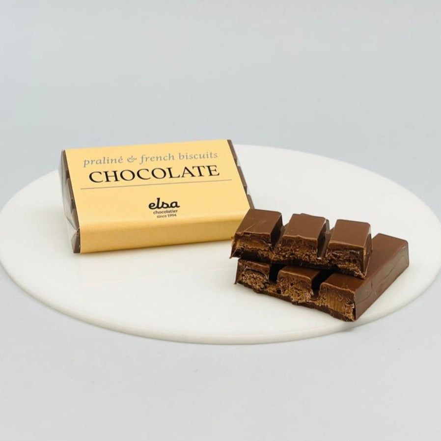 Belgian chocolate bar filled with pralines and french biscuits